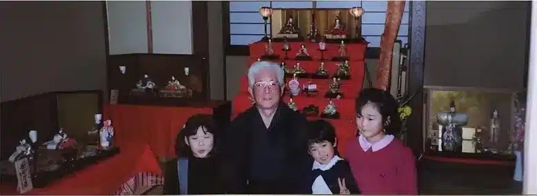 Photo of Tao Okamoto as a child with her two sisters